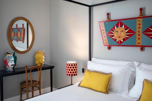 Katil atau katil-katil dalam bilik di Vossia Luxury Rooms & Sicilian Living