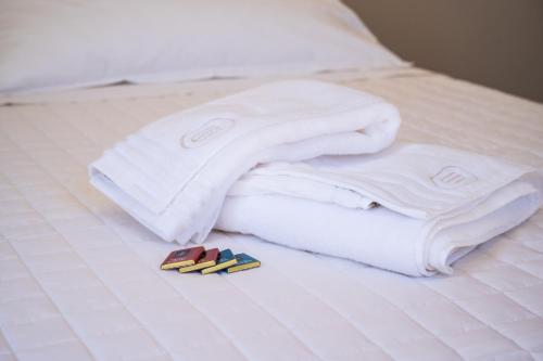 Postel nebo postele na pokoji v ubytování ViaNettuno