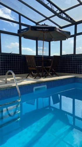 Πισίνα στο ή κοντά στο Aquarius Hotel Flat Residence