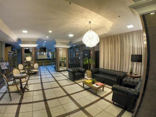 Χώρος καθιστικού στο Aquarius Hotel Flat Residence
