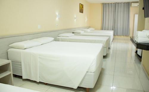 Hotel Dan Inn Express Foz do Iguaçu By Nacional Innにあるベッド
