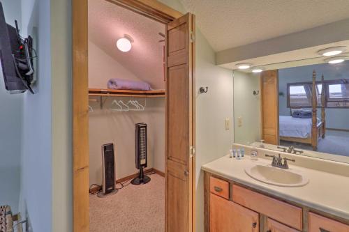 a bathroom with a sink and a mirror at All-Season Base! Unit w/ Balcony in Beech Mountain in Beech Mountain