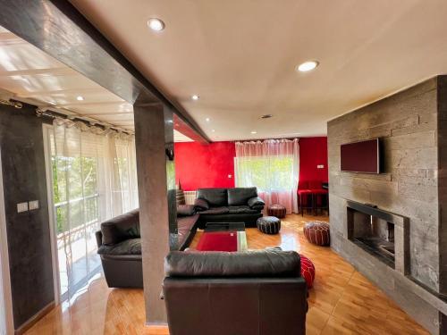 Un lugar para sentarse en Chalet Snow Valley - Private Pool