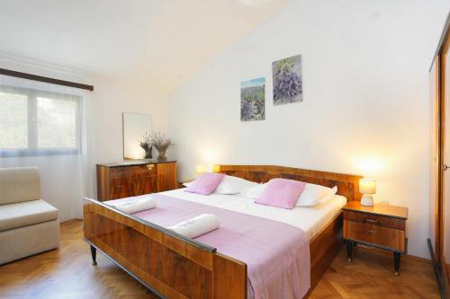 Posteľ alebo postele v izbe v ubytovaní Apartments by the sea Podgora, Makarska - 11432