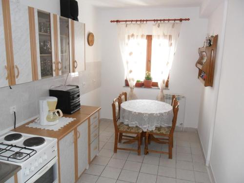 Apartments with a parking space Senj - 11605