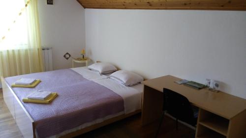 Voodi või voodid majutusasutuse Holiday house with a parking space Smoljanac, Plitvice - 13741 toas