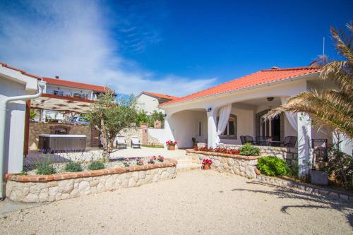 Fotografia z galérie ubytovania Seaside holiday house Barbat, Rab - 13806 v Rabe