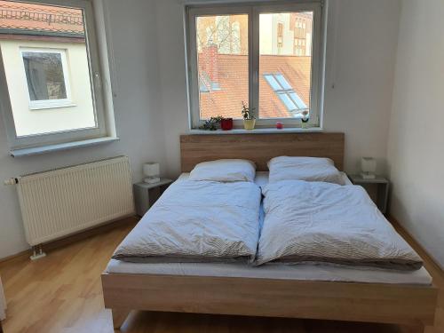 Postel nebo postele na pokoji v ubytování Helles 3 Raum Appartement DRAGO auf der Dominsel im Herzen der Stadt