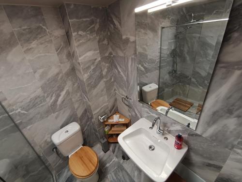 Kúpeľňa v ubytovaní AcroView