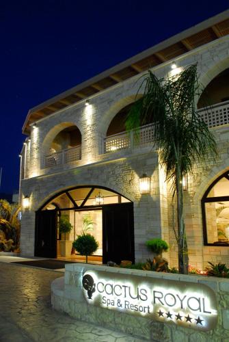 a building with a sign in front of it at Cactus Royal Spa & Resort Adults Only in Stalida