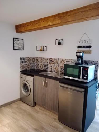 Η κουζίνα ή μικρή κουζίνα στο Le Boulary