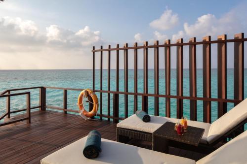 a view of the ocean from the deck of a cruise ship at Heritance Aarah - Premium All Inclusive - 40 Minutes away from Male by Seaplane in Raa Atoll
