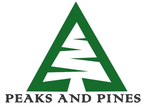 a green christmas tree with the words peaks and pine at Peaks And Pines Resort in Lansdowne