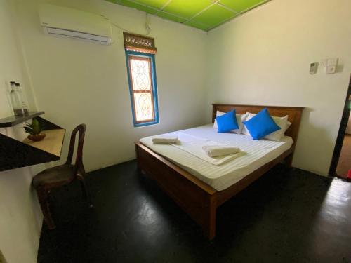 Postel nebo postele na pokoji v ubytování Coco Hostels - Arugambay