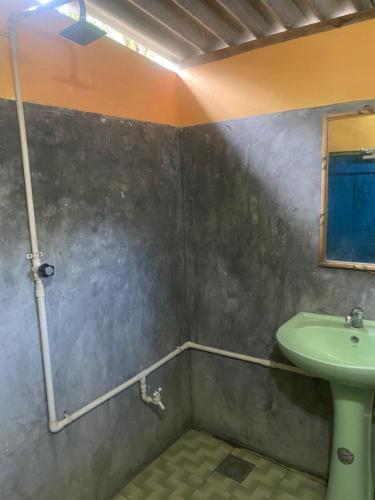Koupelna v ubytování Coco Hostels - Arugambay
