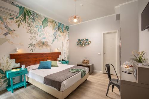 Postel nebo postele na pokoji v ubytování Urban Garden Hotel