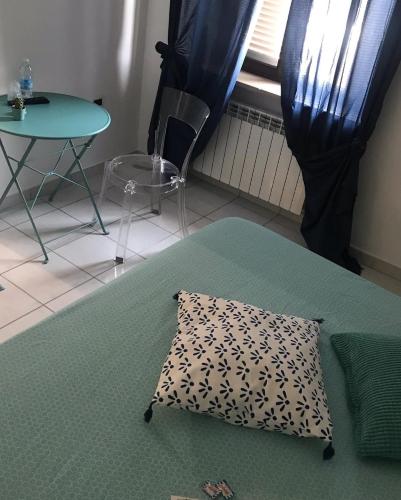 Ένα ή περισσότερα κρεβάτια σε δωμάτιο στο Casa Tognetti Affittacamere