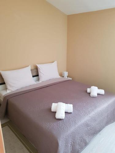 Postel nebo postele na pokoji v ubytování Apartment Leonardo