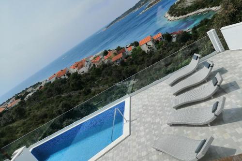 Swimmingpoolen hos eller tæt på Apartments with swimming pool Kanica, Rogoznica - 11249