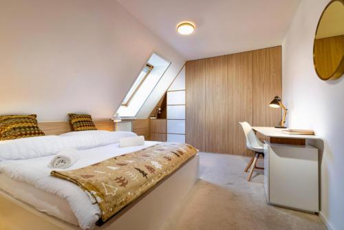 Postel nebo postele na pokoji v ubytování TATRYSTAY Cactus Cozy Apartments Tatry view