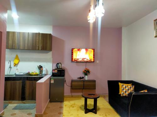 Kuchyň nebo kuchyňský kout v ubytování Joy fully furnished apartment