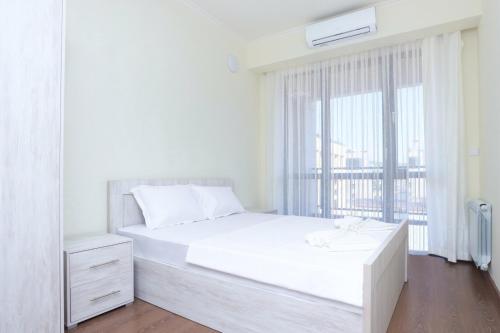 Katil atau katil-katil dalam bilik di Apart-hotel on Koghbatsi 16