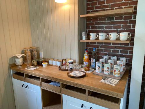a counter in a kitchen with food on it at Das Anni's in Wangerland