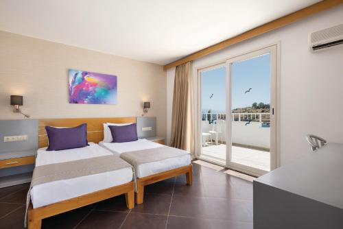La Quinta by Wyndham Bodrumにあるベッド