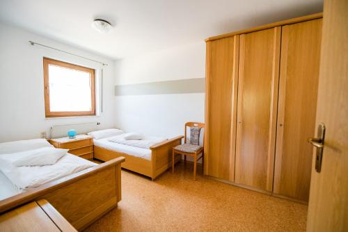 Postel nebo postele na pokoji v ubytování Appartementanlage Marianne