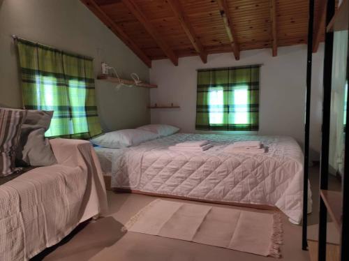 Postel nebo postele na pokoji v ubytování ''Koukmos beach'' Greenspace Living