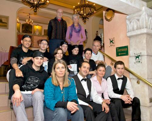 a group of people are posing for a picture at Logis Gourmet & Relax Hotel De La Sure in Esch-sur-Sûre