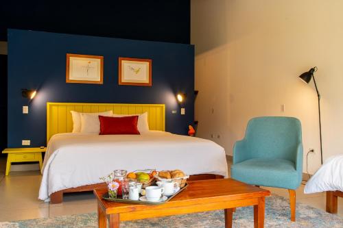 Ένα ή περισσότερα κρεβάτια σε δωμάτιο στο Gocta Andes Lodge