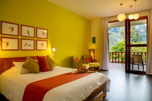 Ένα ή περισσότερα κρεβάτια σε δωμάτιο στο Gocta Andes Lodge