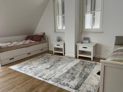 Ένα ή περισσότερα κρεβάτια σε δωμάτιο στο Ferienhaus Austernfischer
