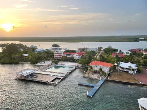an aerial view of a small island in the water at Coral View Beach Resort in Utila