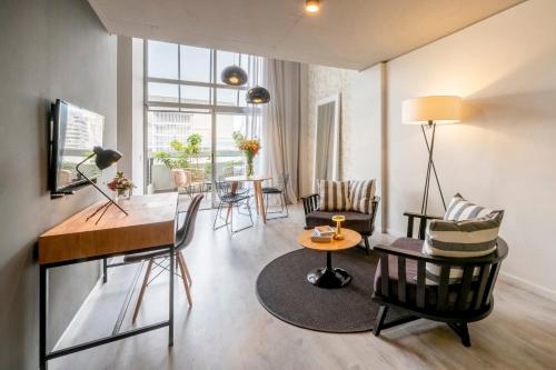 TV a/nebo společenská místnost v ubytování Top Rentals Montañeses