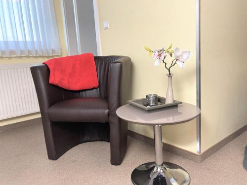 Posezení v ubytování Haus Hotel & Pension am Birnengarten