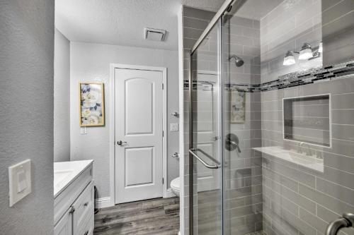 a bathroom with a shower and a sink and a toilet at Cute Central Placerville Studio Pet Friendly in Placerville