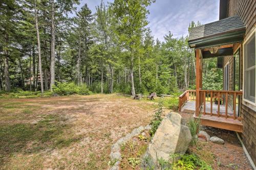 an empty yard next to a house at Hidden Gem Cottage Near Blue Hill Peninsula in Brooklin