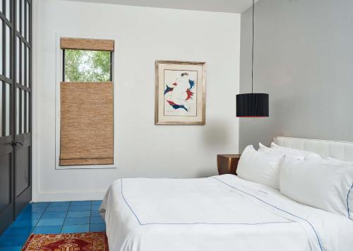Katil atau katil-katil dalam bilik di Hotel Saint Cecilia