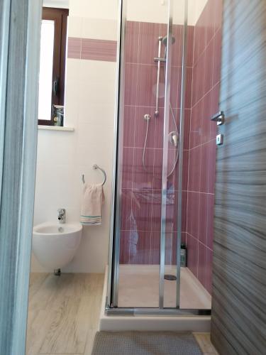 a bathroom with a shower and a sink at Ortona Holiday B&B in Ortona