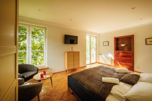 Cama ou camas em um quarto em Orkana 13 Apartments