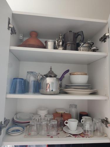 Una cocina o zona de cocina en L'Orchidée de Kénitra