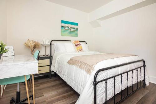 a bedroom with a bed and a desk at Sleeps 3, Cozy, Boho Style, in the heart of Miami -free parking in Miami
