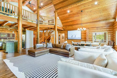 a large living room with wooden walls and ceilings at Alderbrook Grove in Union
