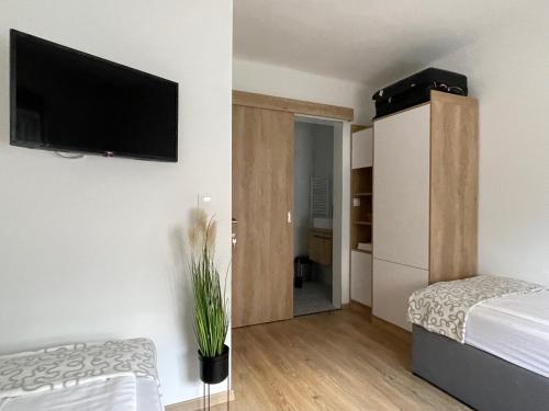 D 20 Apartmanház Zalaegerszeg Dózsa György utca 20にあるベッド