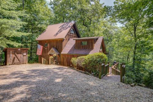 a large barn with a fence and a driveway at Lazy Days Cabin in Blue Ridge