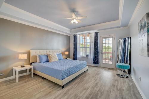 a bedroom with a bed and a ceiling fan at Hill Country Haven in Lago Vista