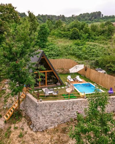 an overhead view of a house with a swimming pool at SAPANCA BUNGALOVCA in Sapanca