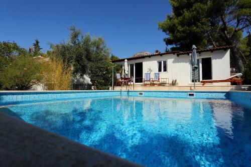 The swimming pool at or close to Family friendly apartments with a swimming pool Bol, Brac - 14379